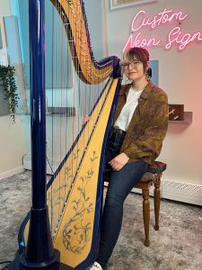 Emily Hopkins and her Camac harp