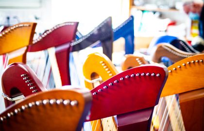 A range of Camac harps on display during the EIHF 2022 festival as part of the annual Harpmakers' Exhibition. © Chantal Guevara 2022. All rights reserved.