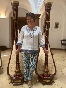 Petra van der Heide with two beautiful Camac Elysée harps.