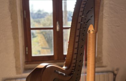 A Camac harp bathed in the afternoon light of Provence.